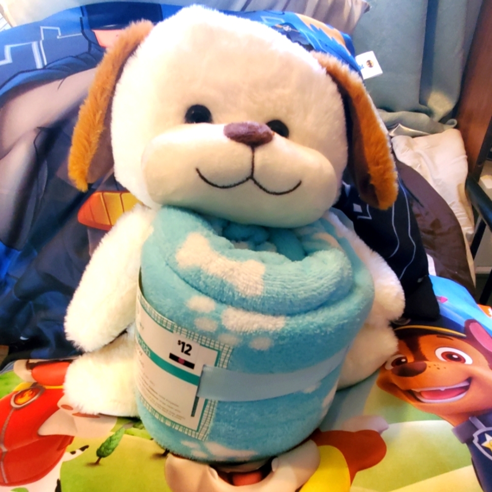 Stuffed dog with throw blanket